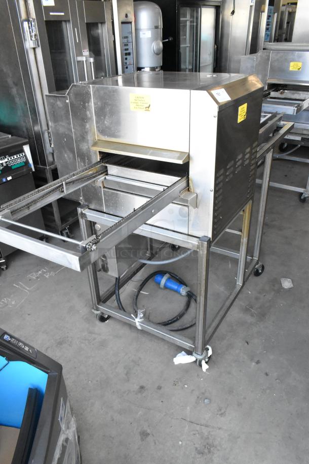 Belshaw TG50 stainless steel thermoglazing station, on casters, 208V, 1 phase. Commercial use. Visible caution labels.