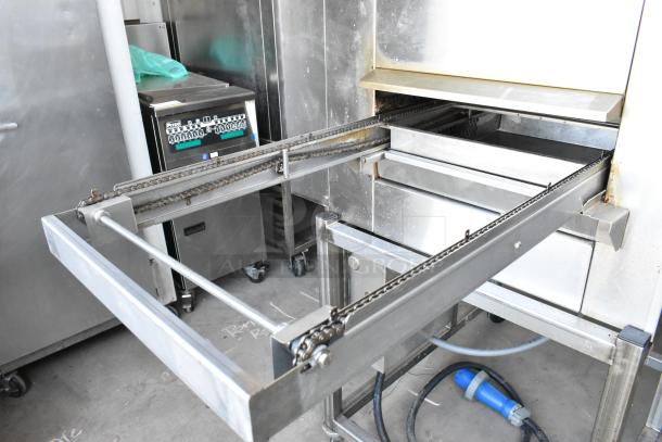 Belshaw TG50 stainless steel thermoglazing station, floor model with commercial casters. Runs on 208 volts, 1 phase.
