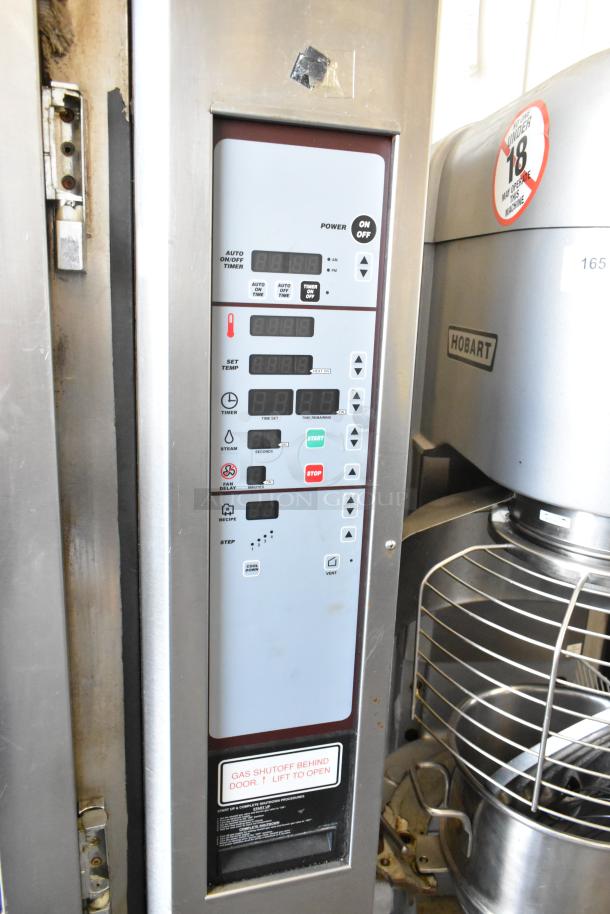 Baxter stainless steel commercial rotating rack oven, natural gas powered, digital controls, with double pan rack and casters.