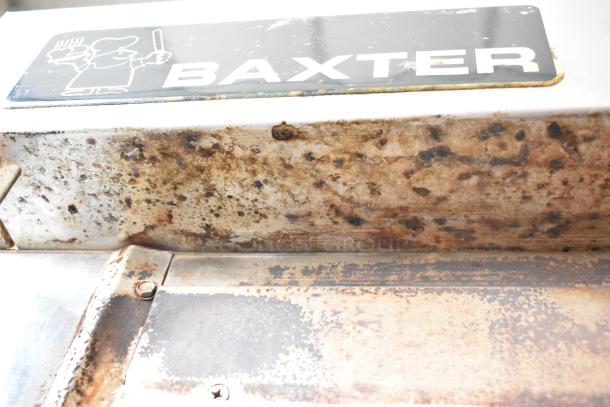 Baxter stainless steel commercial natural gas mini rotating rack oven, double pan rack, visible wear, commercial casters.