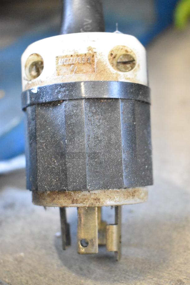 Close-up of a plug relevant to the Hobart M802 Commercial Dough Mixer, showing electrical connections and worn condition.