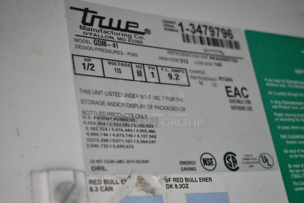 True GDM-41 cooler label showing model details, NSF certification, 115 volts, 1 phase, 9.2 amps, R134A refrigerant.