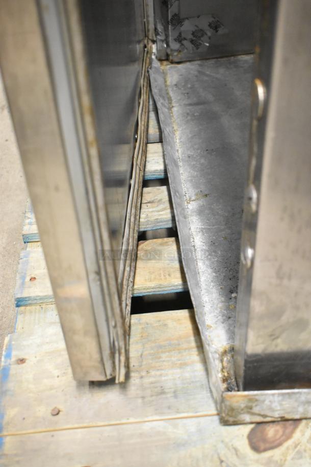 Baxter RP100 stainless steel commercial roll-in rack proofer, electric powered, shown on a wooden pallet, 208/240V, 1 phase.