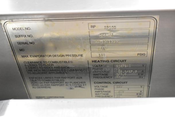Baxter RP100 stainless steel commercial proofer label showing model, serial number, voltage, and specifications.