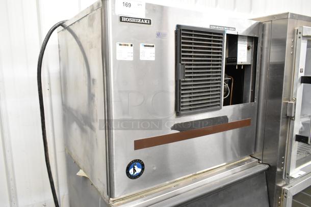 Hoshizaki KML-631MAH stainless steel commercial ice head on ice bin, 208-230V, 1 Phase, visible brand and model labels.