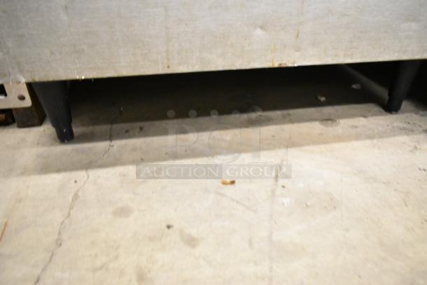 Hoshizaki KML-631MAH stainless steel ice maker on commercial bin, 208-230V, 1 phase. Slight wear, sturdy metal legs.