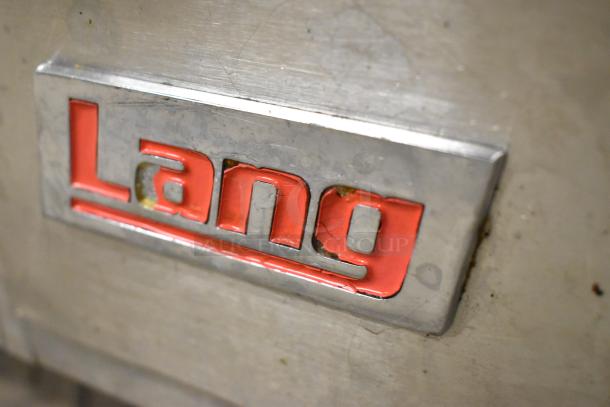 Lang stainless steel commercial countertop flat top griddle, red Lang logo, durable construction.