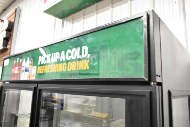 True GEM-49 2-door reach-in cooler, metal with poly-coated racks, 115V, 1 phase. Includes "Pick Up a Cold Drink" signage.