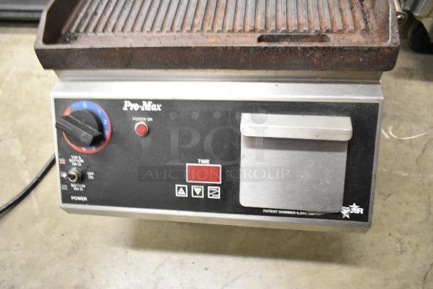 Star Pro-Max CG14IT commercial countertop panini press, stainless steel, 120V, 1 phase. Features timer and power controls.