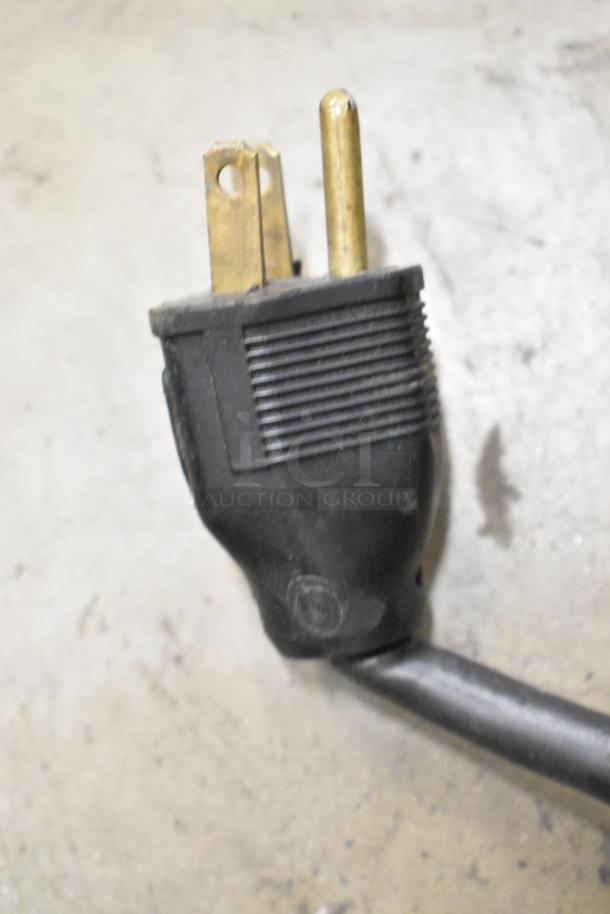 The image shows a black power plug for the Star Pro-Max CG14IT Panini Press.