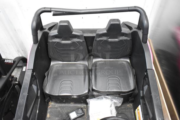 2022 Pinghu 2000W Electric Children's Car, two black seats, good condition, visible control panel, and footwell.