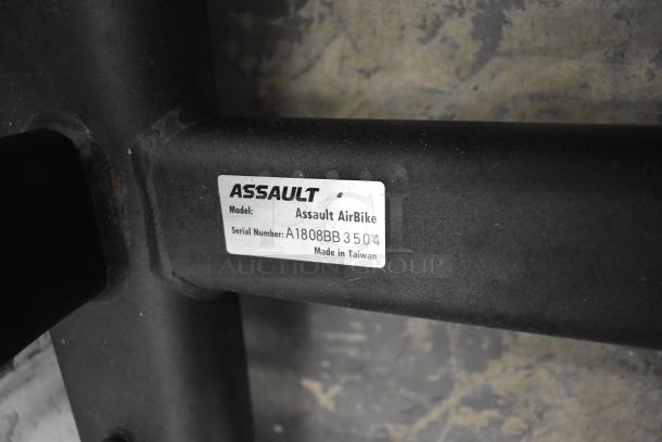 Assault Fitness stationary exercise bicycle, model Assault AirBike, serial number A1808BB3504, made in Taiwan.