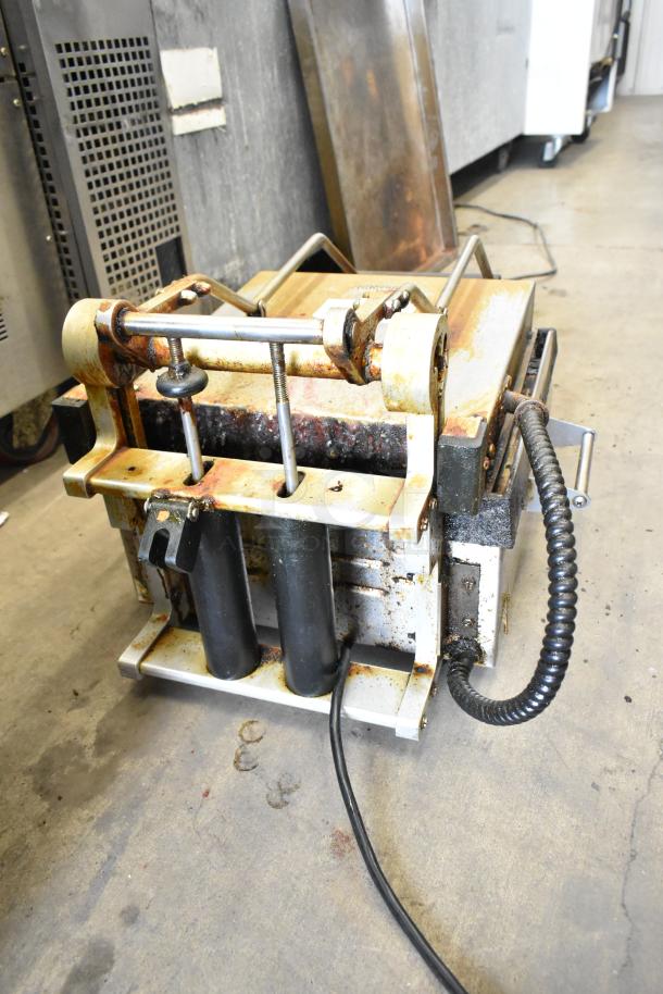 Metal commercial countertop panini press merchandiser, 115 volts, 1 phase. Visible wear and rust; ideal for refurbishing.