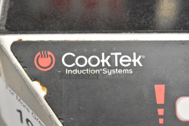 2016 CookTek MC1800 stainless steel induction range, visible logo and control panel, moderate wear, 120V, single phase.
