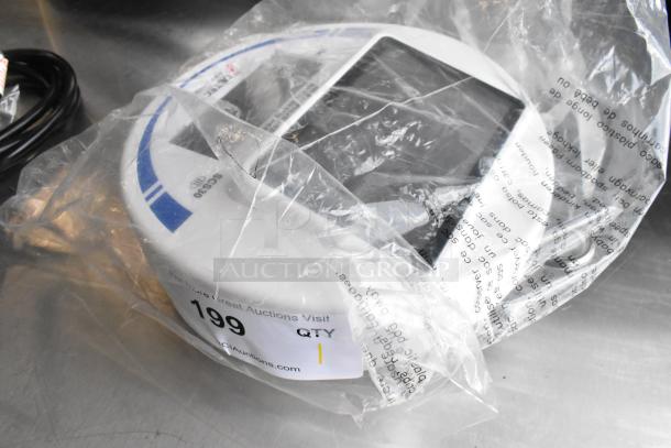 Brand new Cardinal Detecto SCS30 30 lb. solar power hanging scale, scratch and dent, sealed in plastic with auction label.