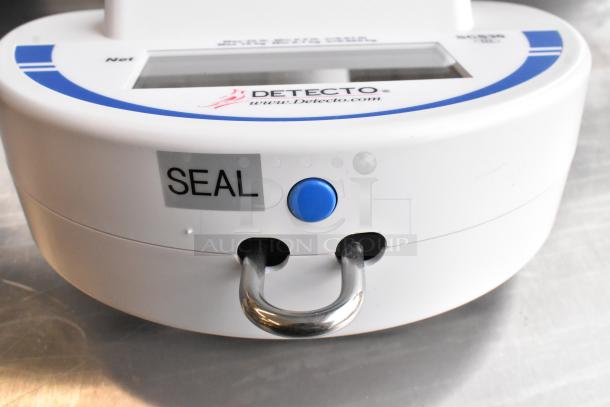 Brand new Cardinal Detecto SCS30 30 lb. solar-powered hanging scale, scratch and dent, with visible seal tag and display.