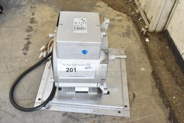Nidec motor, 115-120 volts, 1 phase, mounted on a metal base. Features visible wiring and label with auction info.