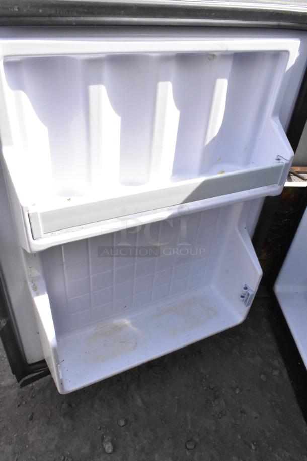 WW17128-4a mini cooler interior with storage compartments. Condition shows wear. 115 volts, 1 phase power requirement.