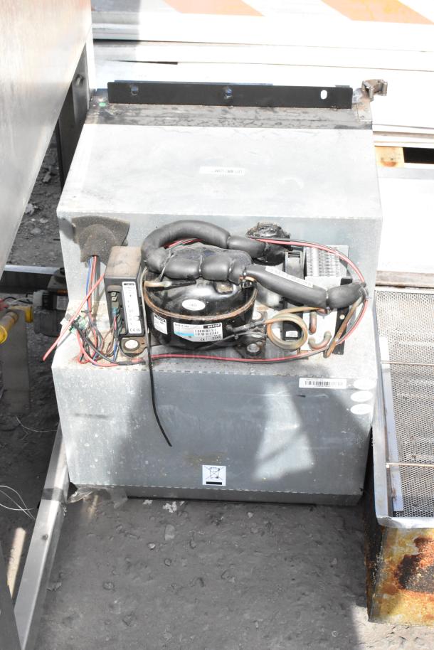 WW17128-4a Mini Cooler, 115 Volts, 1 Phase, visible wiring, metal casing, weathered condition, manufacturer label present.
