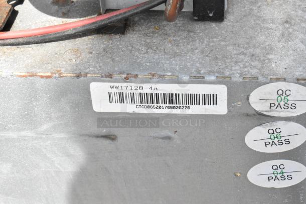 WW17128-4a mini cooler with visible barcode and QC pass labels. 115 Volts, 1 Phase. Slight wear on metal surface.