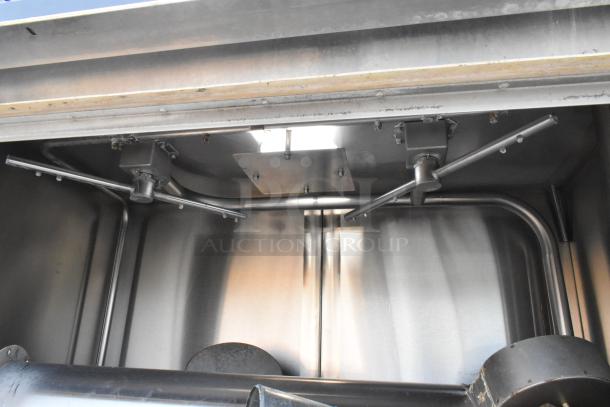 Douglas SD-20-IREL stainless steel pot and pan washer, 480V, 3-phase. Interior view showing sturdy construction and spray arms.