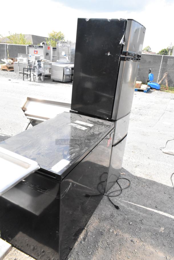 Three black appliances, including a Frigidaire chest freezer, Danby and Galanz mini coolers. 115V, 1 phase. Visible wear.