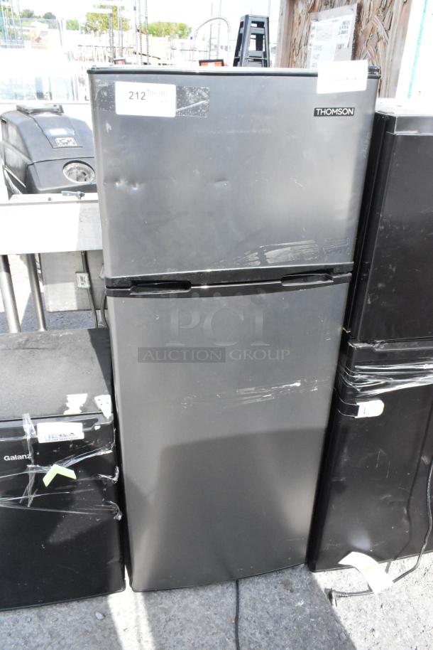 Four mini coolers including Galanz GLR25MBKE02, Thomson TFR725 with freezer, Hisense WMS017M6XBE, Galanz GLR33MBKE23.