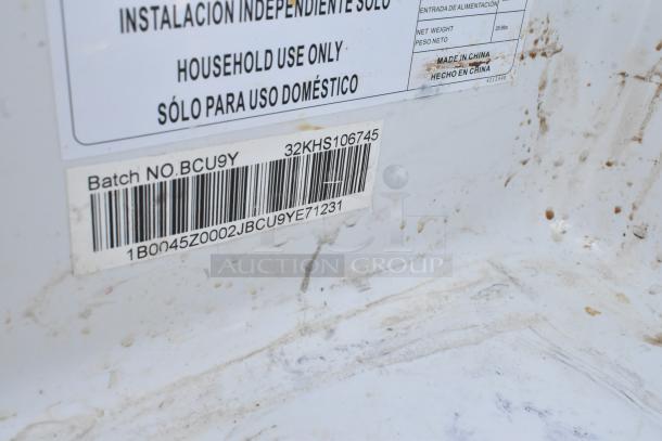 Barcode and label on appliance specifying batch number BCU9Y, serial number 1B0045Z0002JBCU9YE71231, and "Made in China."