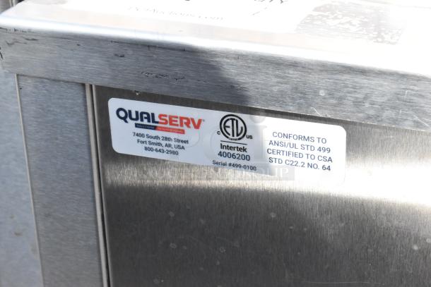 QualServ stainless steel portable sink with commercial casters, shown with certification and contact label.
