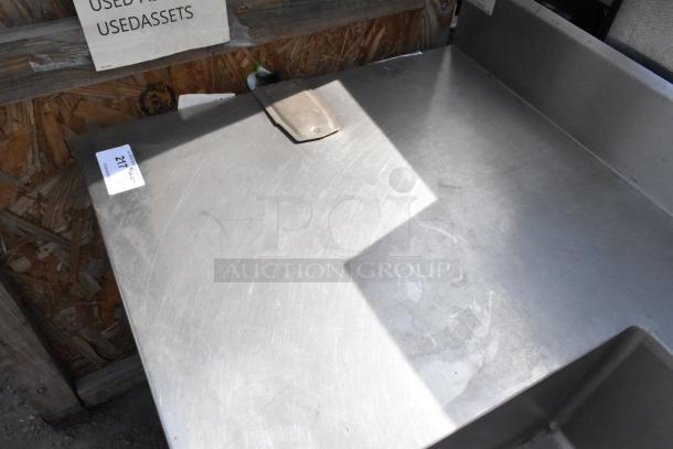 Stainless steel single bay sink with under shelf, solid surface, label "271" visible, good condition.