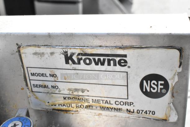 Krowne stainless steel single bay sink with side splash guard. Features NSF certification. Model and serial numbers not specified.