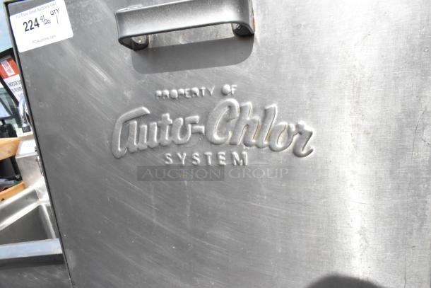 Auto-Chlor AC stainless steel commercial front load dishwasher, 115 volts, 1 phase, visible brand embossing on the door.