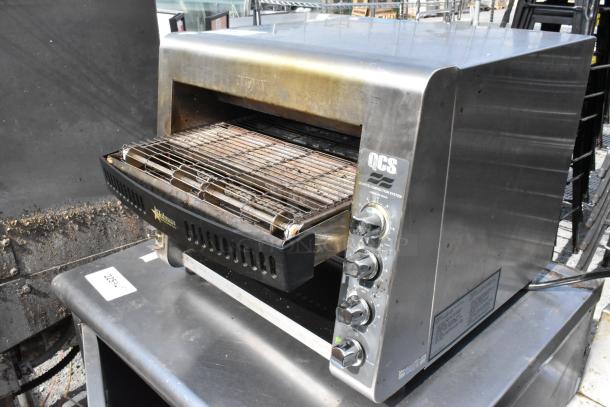 Star Holman QCS-3-145BHC stainless steel countertop conveyor toaster oven, 208V, 1 phase, with control dials and rack.