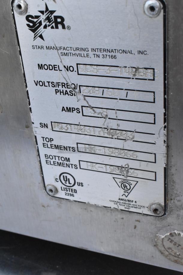 Star Holman QCS-3-145BHC stainless steel conveyor toaster oven label showing model details, 208 volts, 1 phase.