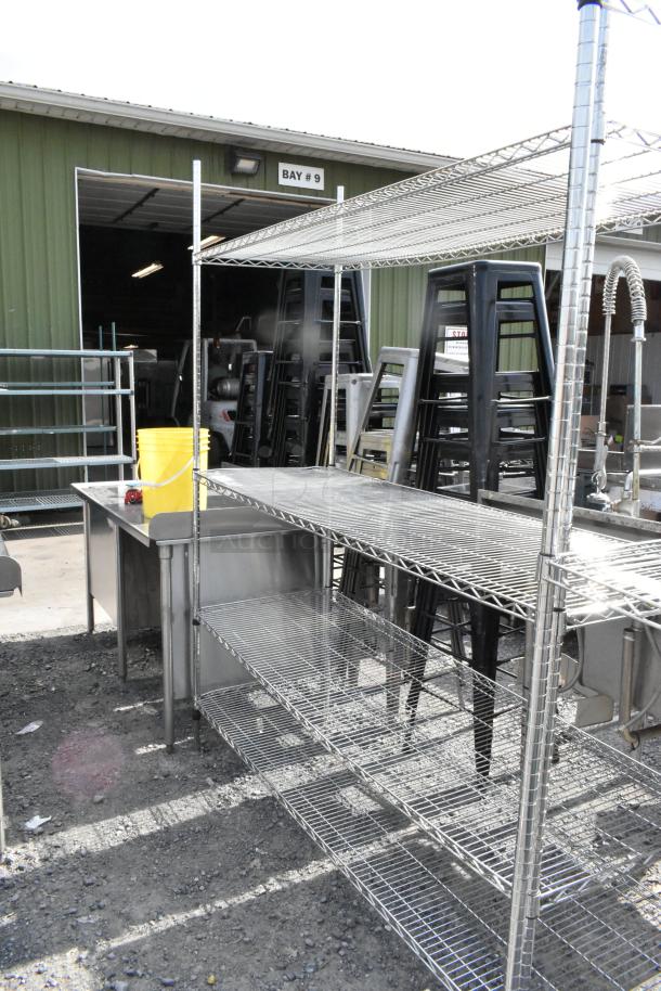 Chrome finish 4-tier wire shelving unit, sturdy design, good condition, buyer dismantling required.