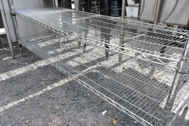 Chrome finish 4-tier wire shelving unit, sturdy construction, condition as shown, buyer must dismantle.