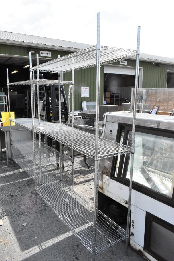 Chrome finish 3 tier wire shelving unit in outdoor setting. Buyer must dismantle. Consider freight charges.