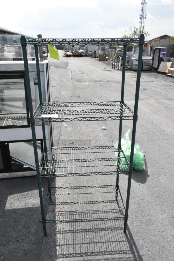Green finish 4-tier wire shelving unit. Good condition, requires buyer dismantling for shipping. Consider freight.