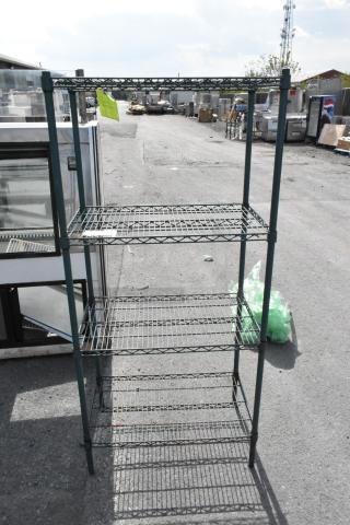 Green finish 4-tier wire shelving unit. Good condition, requires buyer dismantling for shipping. Consider freight.