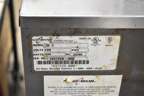 Alto Shaam 750-S Stainless Steel Heated Holding Cabinet label showing model, voltage, and serial number.