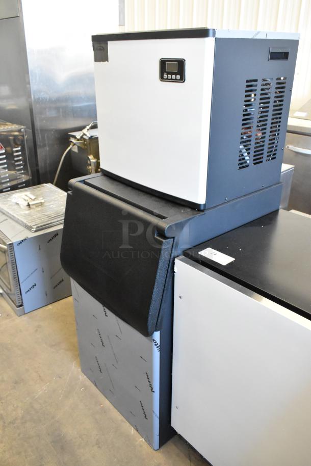 Brand new KoolMore CIM-315 stainless steel commercial ice head on metal ice bin. Scratch and dent, 115 volts, 1 phase.