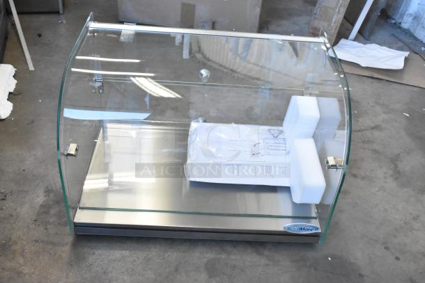 KoolMore DC-2C commercial countertop bakery display case with curved glass, rear door, 1.5 cu. ft. capacity, brand new with minor scratches.