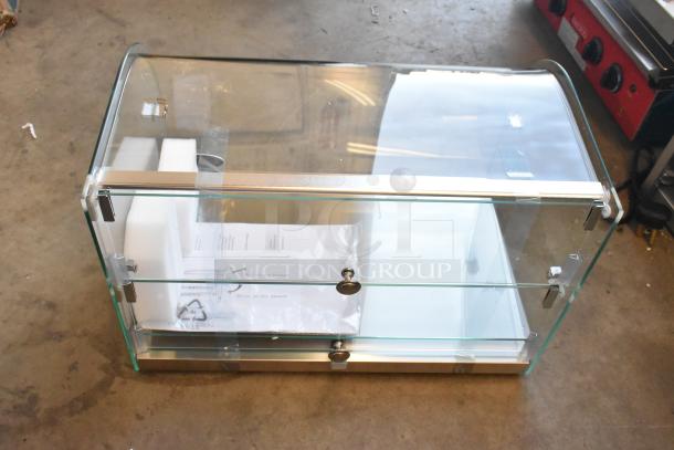Brand new KoolMore DC-2C commercial countertop bakery display case with front curved glass and rear door, 1.5 cu. ft. capacity.