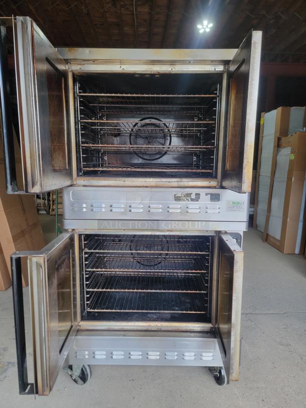 Blodgett DFG-100/200 double convection oven, stainless steel, open doors, visible racks, good condition, ideal for commercial use.