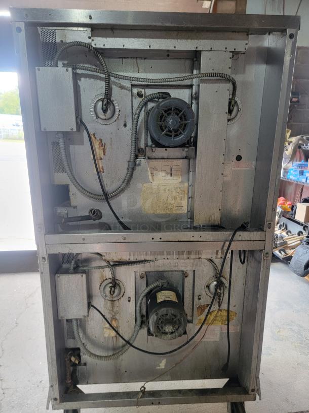 Blodgett DFG-100/200 double convection oven, showing rear components and wiring. Ideal for commercial kitchens.