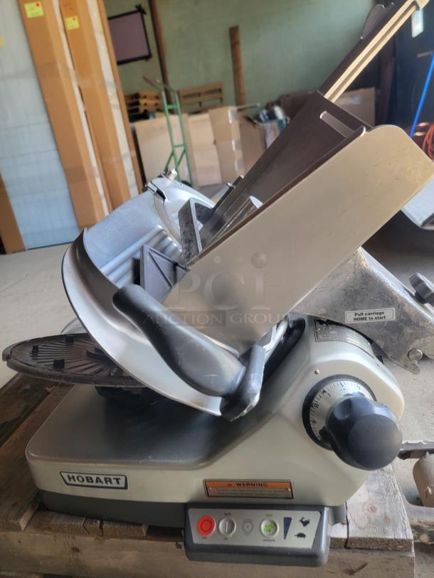 Hobart Model 3913 commercial meat slicer, heavy-duty design, featuring precision control knob and visible labels.