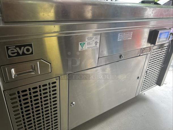 Evo 48" Electric Griddle 48E-10-0148-EVT, stainless steel, front panel with logo and safety labels, commercial-grade.