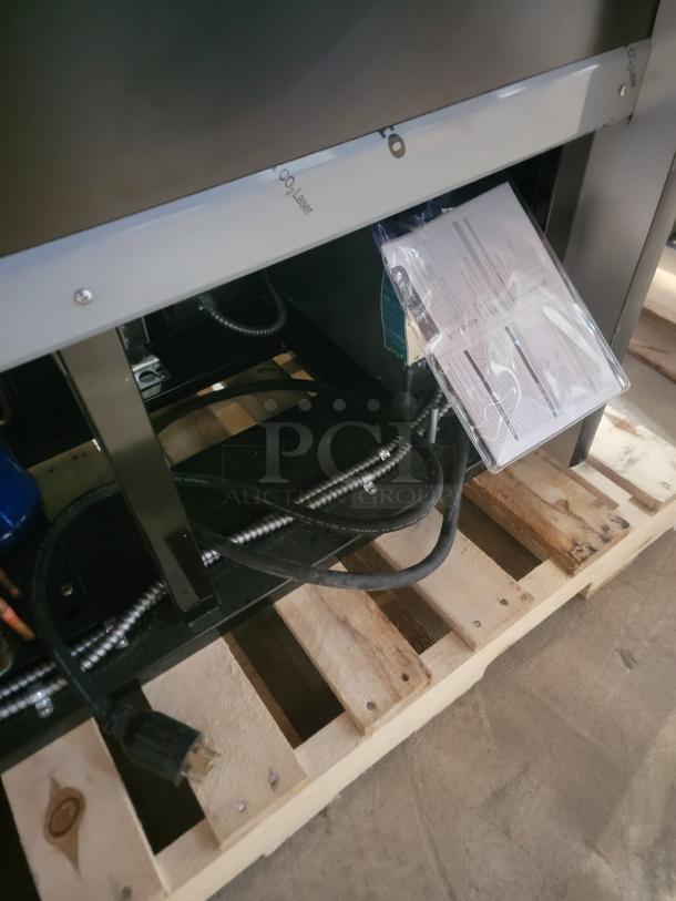 RPI SCRFC7278R Air Screen Merchandiser on pallet, showing electrical components and labels in protective packaging.