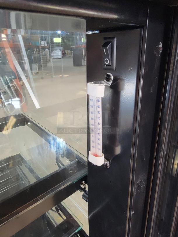 Structural Concepts NE3627RSV refrigerated display case, black frame, glass shelves, temperature gauge shown, tested and working.