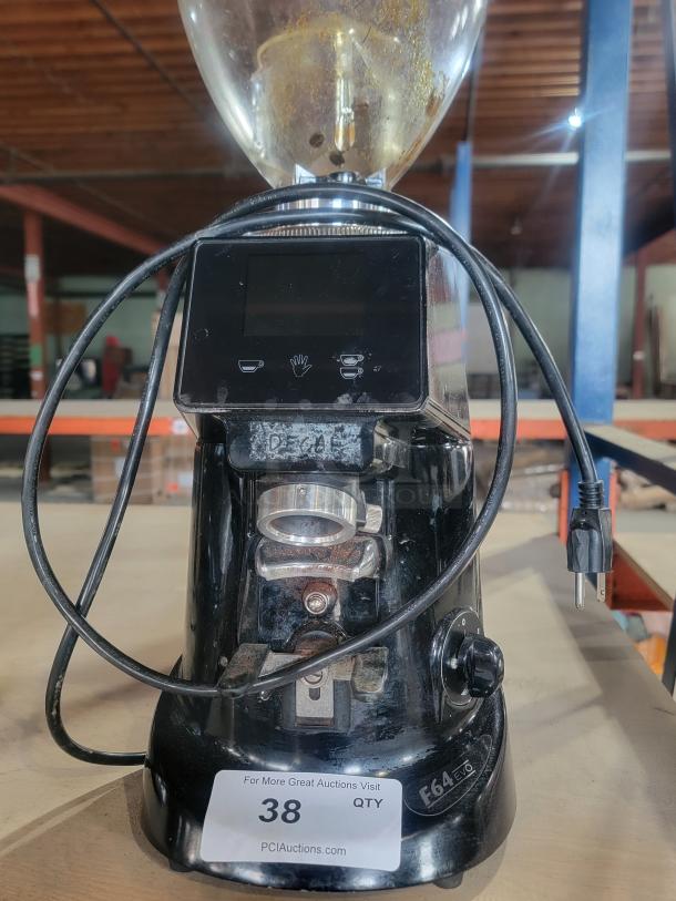 Fiorenzato F64 Evo espresso grinder, black, commercial-grade, visible wear, features digital display, power cord, lot label.